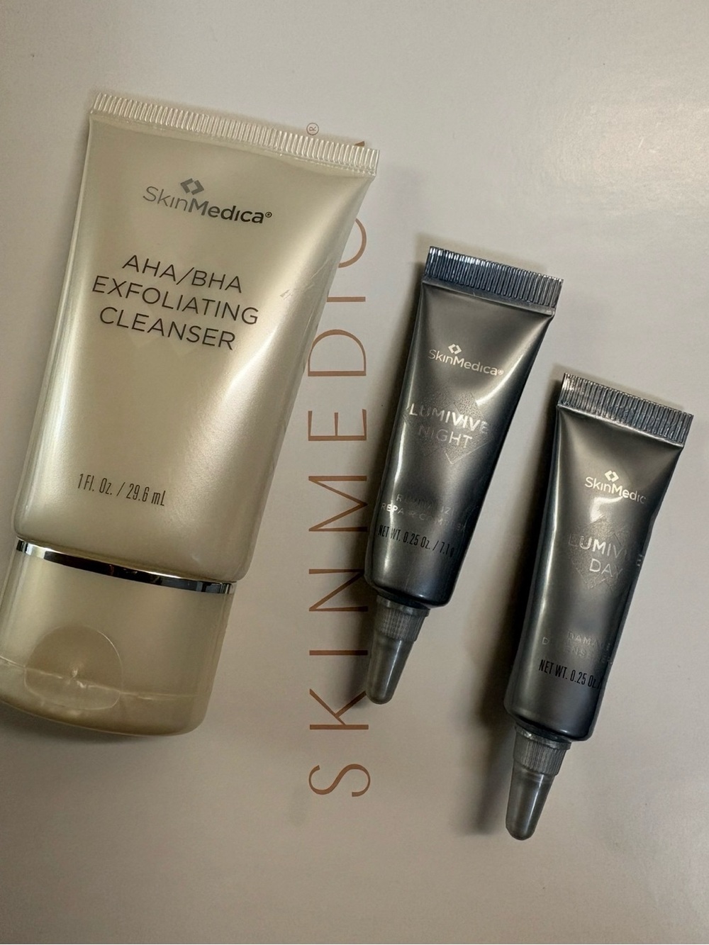 SkinMedica Exfoliating Cleanser with Gray Luminize Day & Night Pair.
